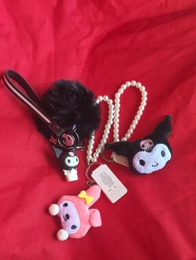 3 Different Sanrio Pink My Melody & Black Kuromi Plush Keychain Set.
